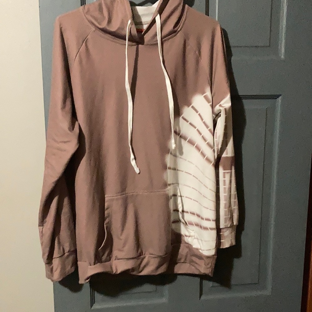Tan with white web like design medium size hoodie!